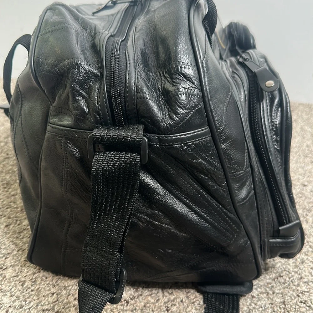 Black leather Bay Area celebrity/AM golf tournament bag